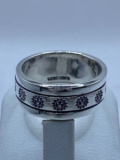 Anillo Spinner de Plata .925 con Diseño de Soles, sello de autenticidad Plata Ley .925