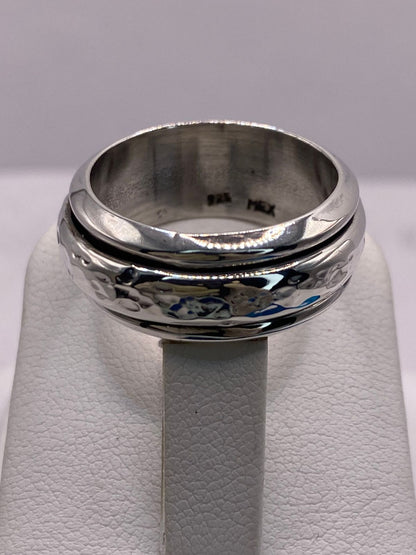 Anillo Spinner Martillado en Plata .925, sello de autenticidad Plata Ley .925
