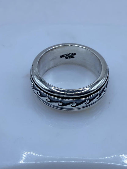 Anillo Spinner Olas Estilizadas en Plata .925, sello de autenticidad Plata Ley .925