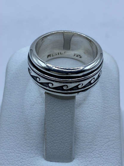 Anillo Spinner Olas Estilizadas en Plata .925, sello de autenticidad Plata Ley .925