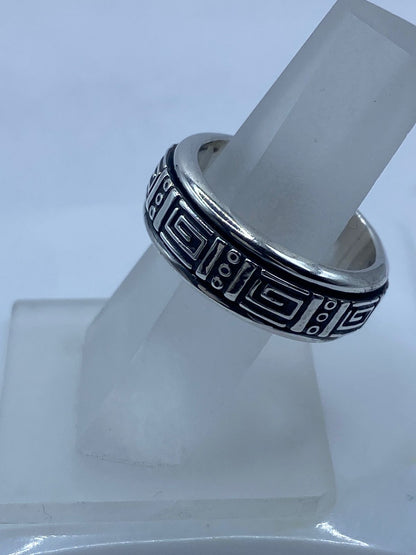 Anillo Spinner de Plata .925 con Diseño Greca Geométrica, vista lateral