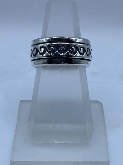 Anillo Spinner de Plata .925 con Diseño de Olas — vista lateral