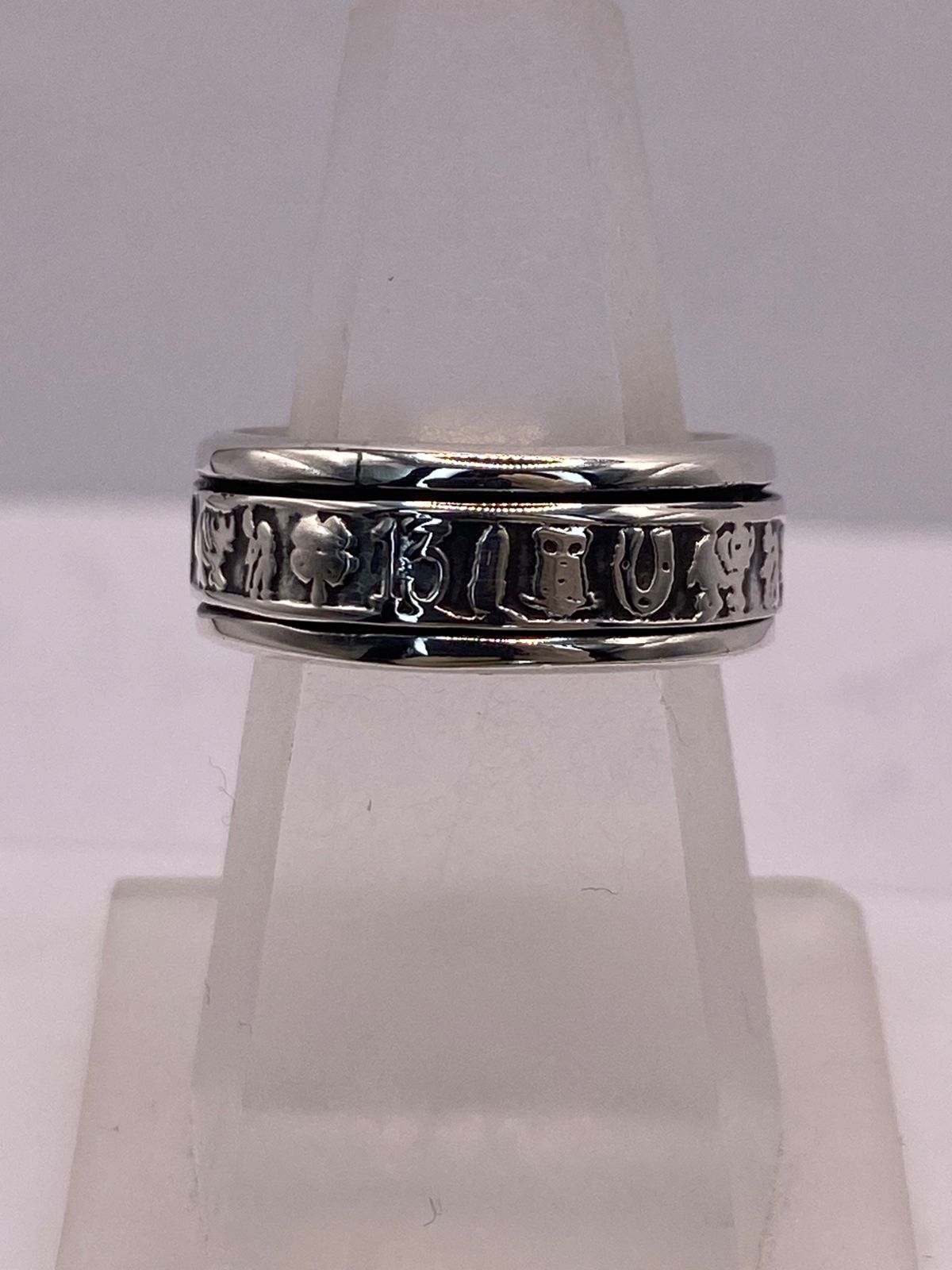Anillo Spinner Símbolos de la Suerte en Plata .925