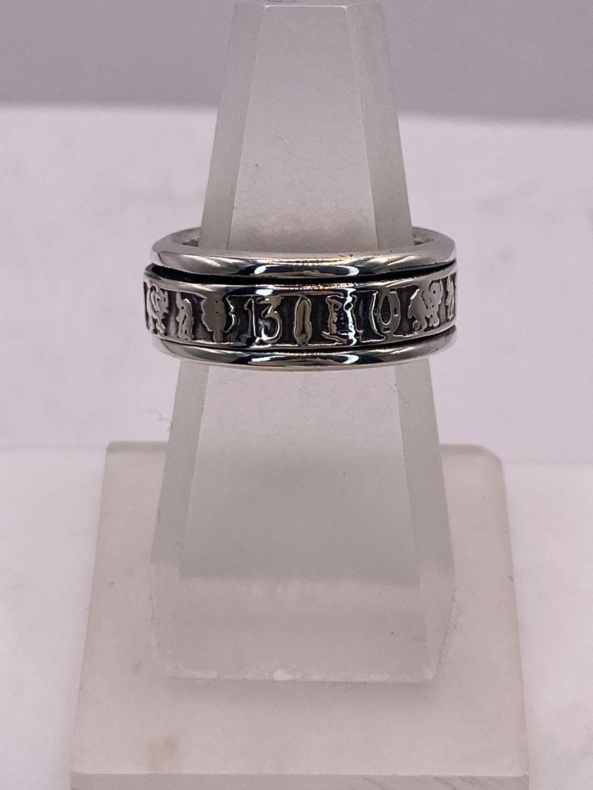 Anillo Spinner Símbolos de la Suerte en Plata .925, vista frontal