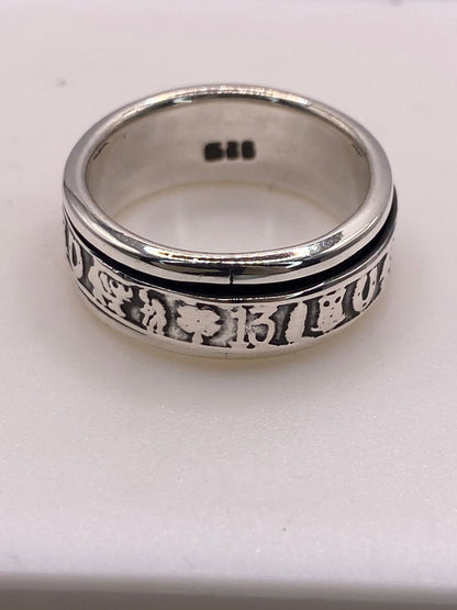 Anillo Spinner Símbolos de la Suerte en Plata .925, sello de autenticidad Plata Ley .925