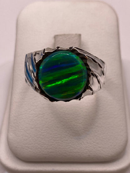 Anillo Tipo Sello Plata Ley 950 con Ópalo de Fuego, vista lateral