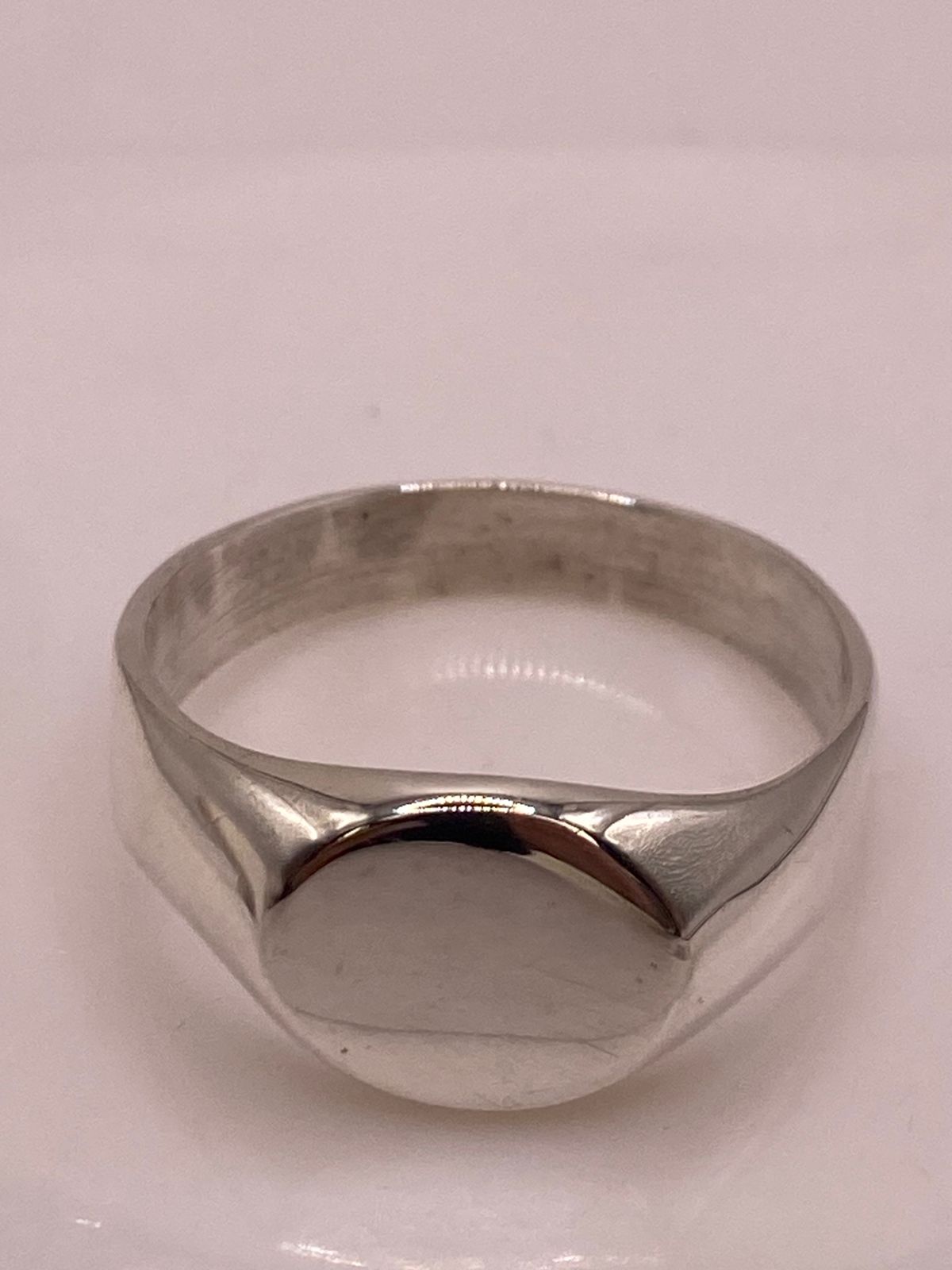 Anillo Tipo Sello Redondo Liso en Plata .925, sello de autenticidad Plata Ley .925