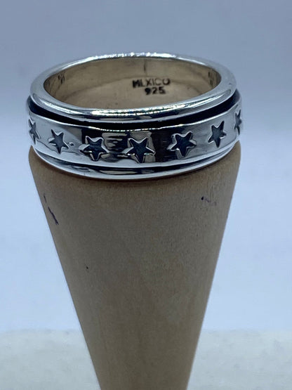 Sello de ley .925 en el interior del anillo giratorio con estrellas en relieve — plata auténtica artesanal Taxco