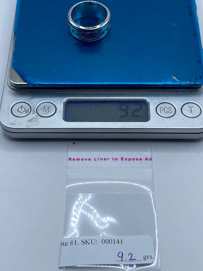 Anillo de plata .925 con pez ictus y mecanismo giratorio sobre superficie — joyería artesanal cristiana mexicana antiestrés Taxco