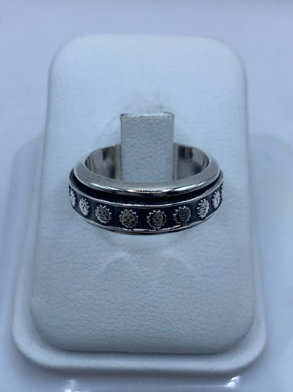 Anillo de plata .925 talla 7 con soles con rostro y mecanismo giratorio — joyería antiestrés prehispánica artesanal mexicana Taxco
