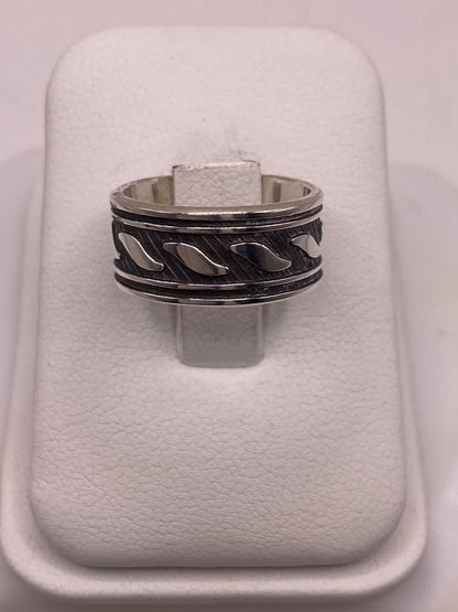 Anillo de Plata 925 con Banda Texturizada y Motivos de Hoja Pulidos, sello de autenticidad Plata Ley .925