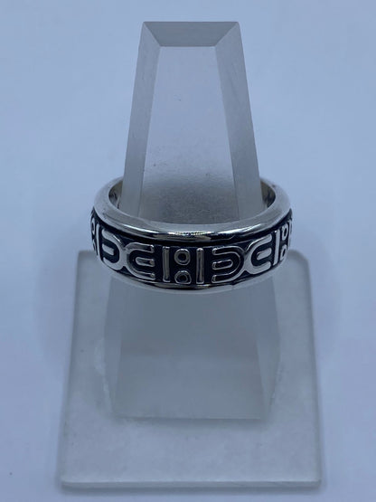 Banda de plata 925 grabado prehispánico con fondo oxidado negro y relieves en alto brillo, Arte Taxco