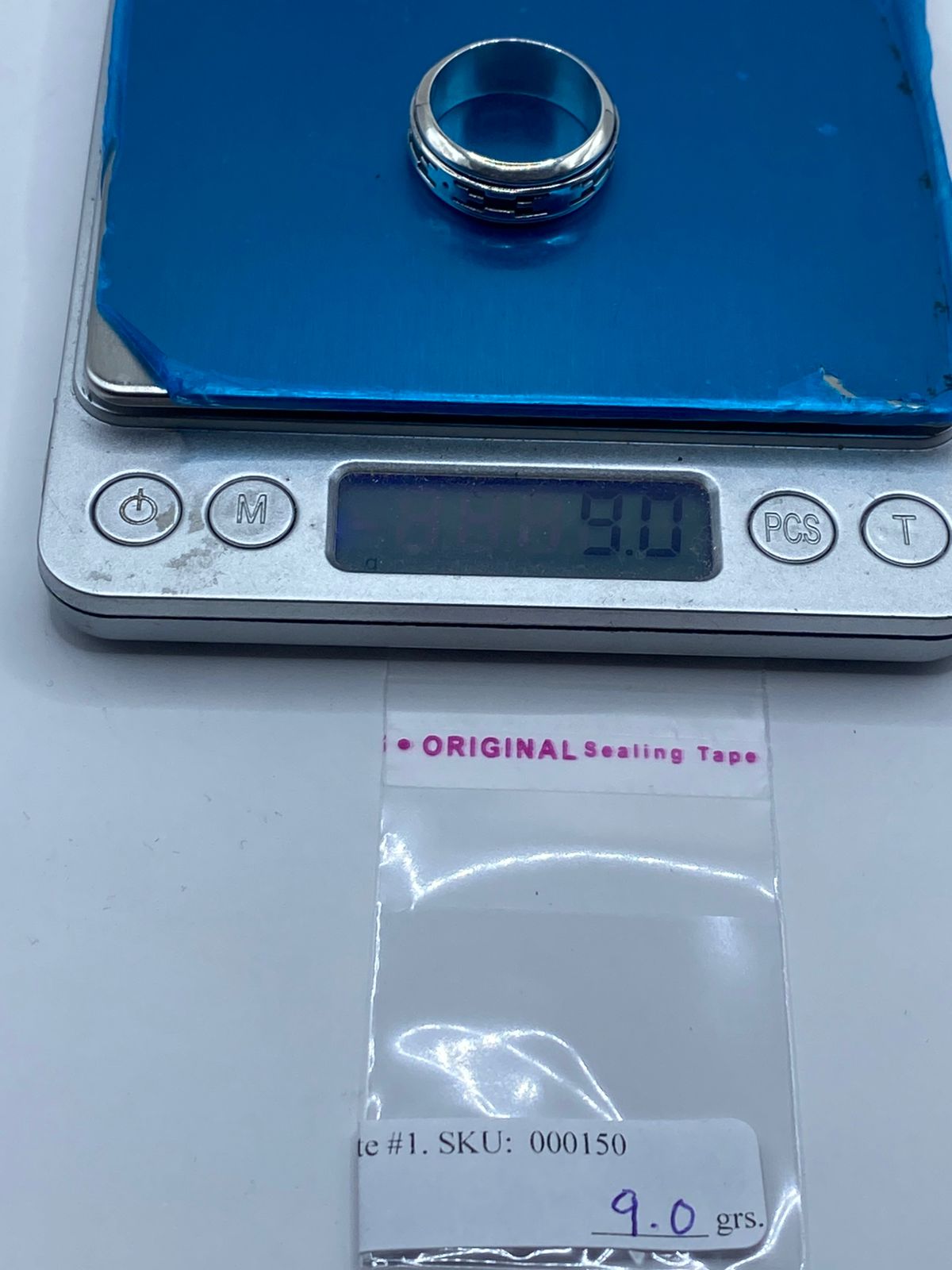 Anillo spinner plata 925 diseño geométrico artesanal Taxco con referencia de escala, Arte Taxco México