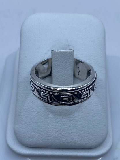 Banda spinner plata 925 con greca angular continua oxidada y rieles pulidos, hecho a mano Arte Taxco (