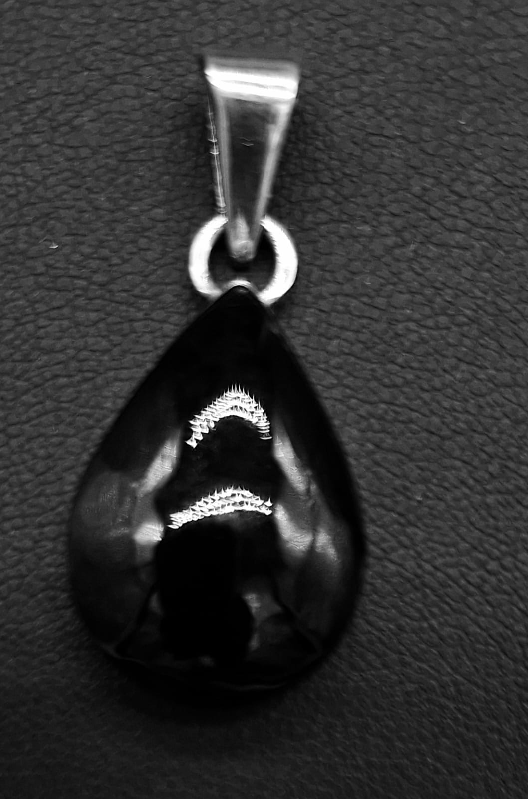 Sello de ley en el interior del dije plata ley 950 , de obsidiana