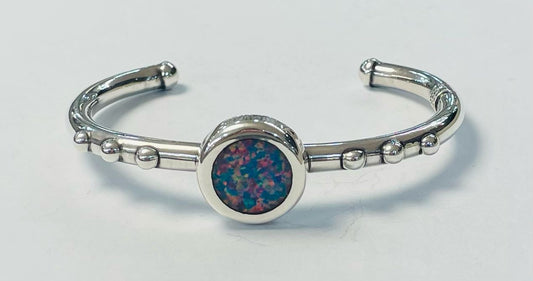 Sello de ley en el interior del brazalete con opalo en plata ley 925